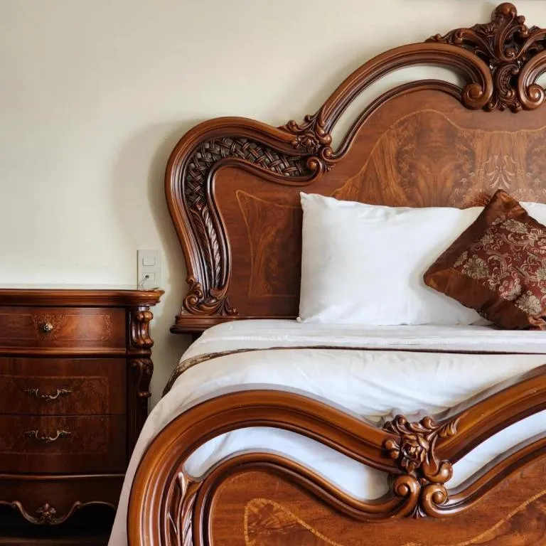 Bed in Marguerite Hotel