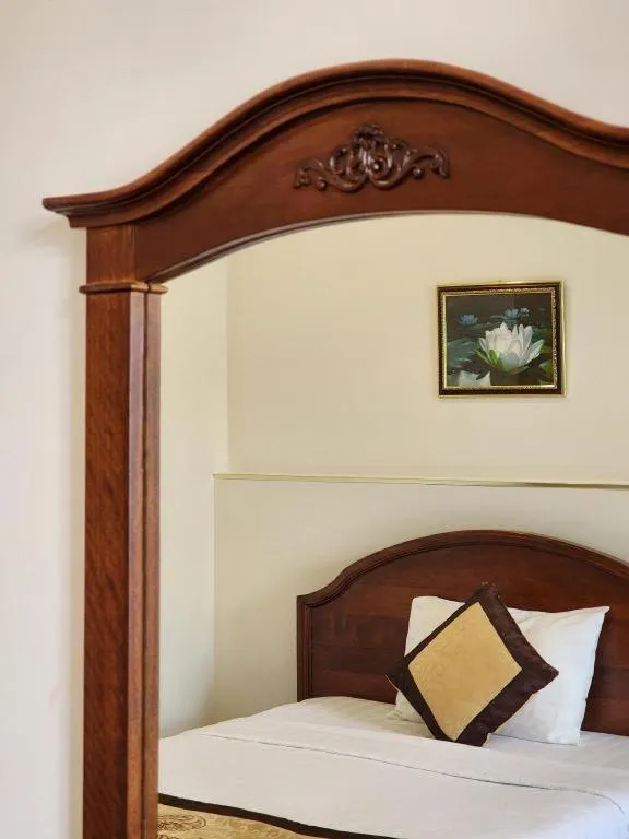 Bed in Marguerite Hotel