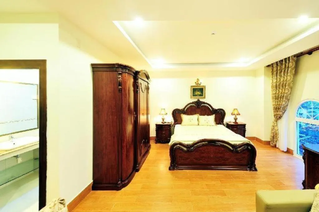 Bed in Marguerite Hotel