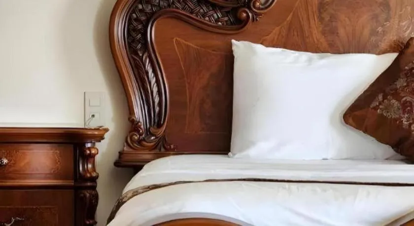 Bed in Marguerite Hotel