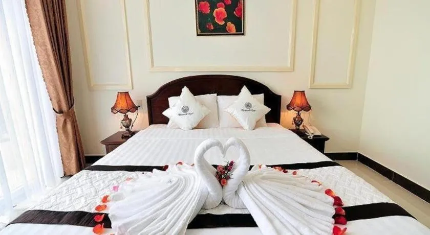 Bed in Marguerite Hotel