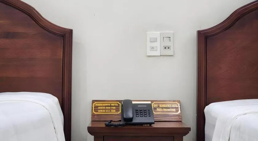 Bed in Marguerite Hotel