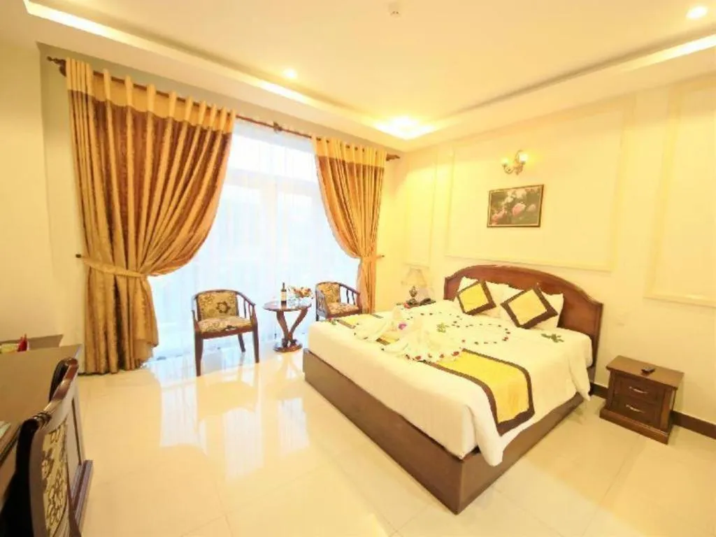 Bed in Marguerite Hotel