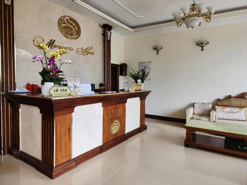 Bed in Marguerite Hotel