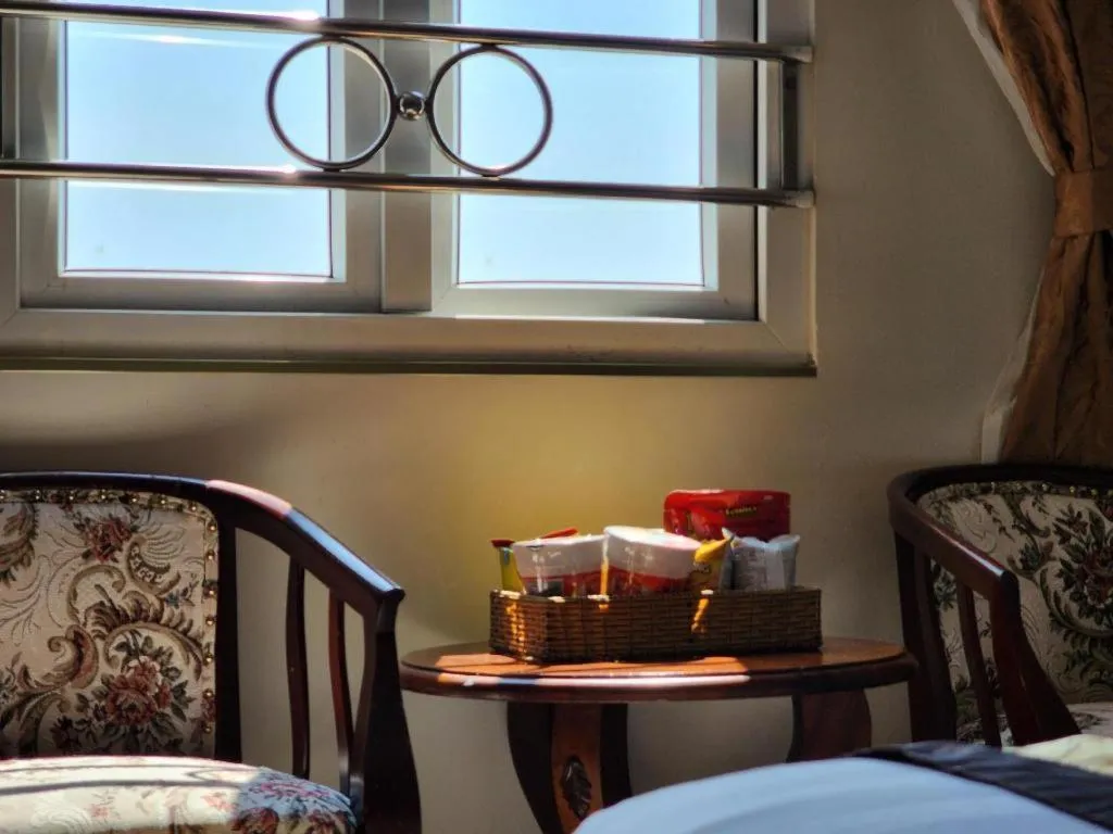 Bed in Marguerite Hotel