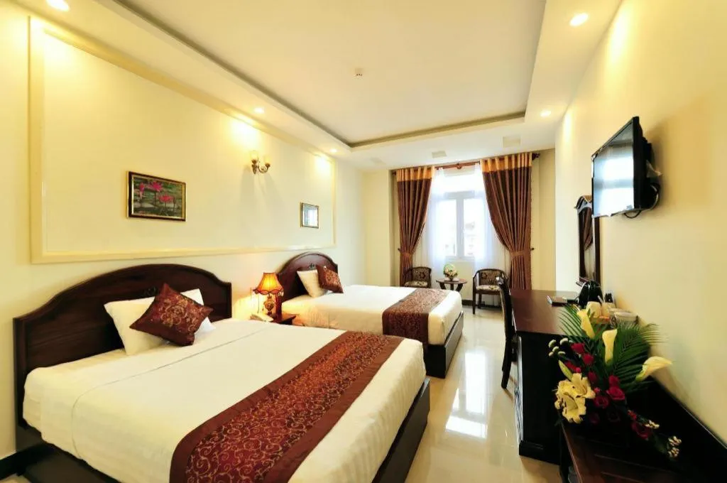 Bed in Marguerite Hotel