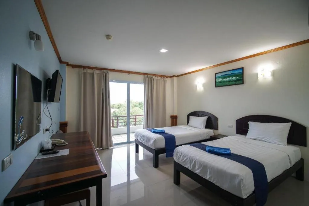 Bed in Sea Mountain Khanom Hotel