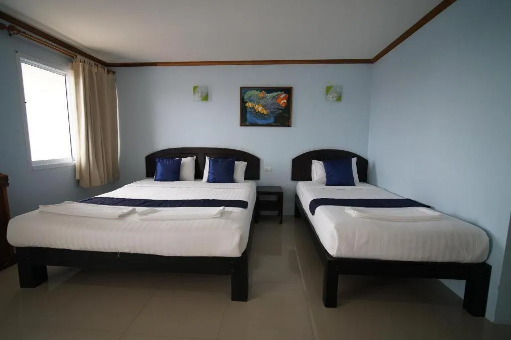 Bed in Sea Mountain Khanom Hotel