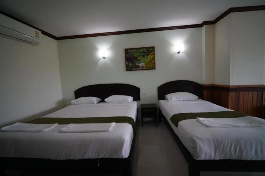 Bed in Sea Mountain Khanom Hotel