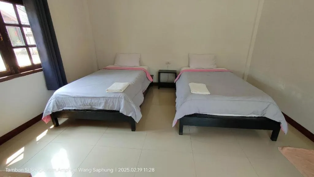 Bed in Suanlamyai Resort