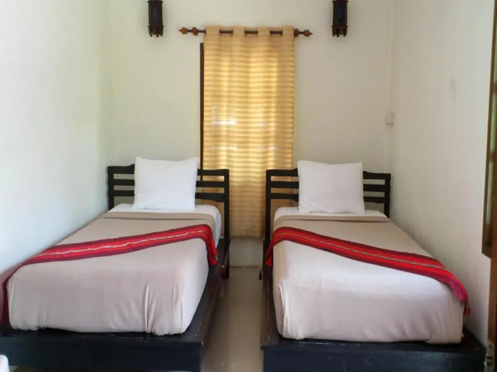 Bed in Suanlamyai Resort