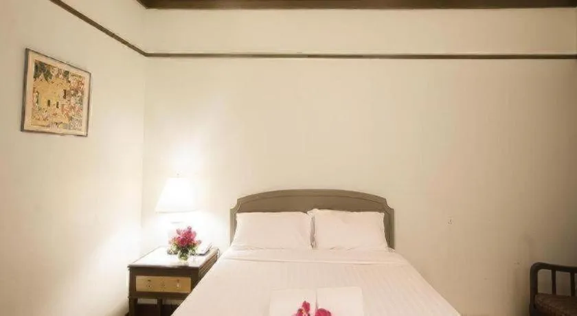 Bed in Grand Plaza Hotel