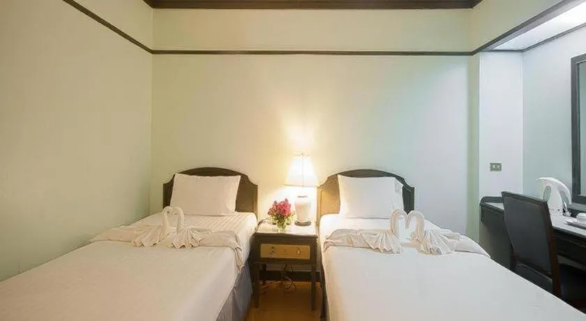 Bed in Grand Plaza Hotel