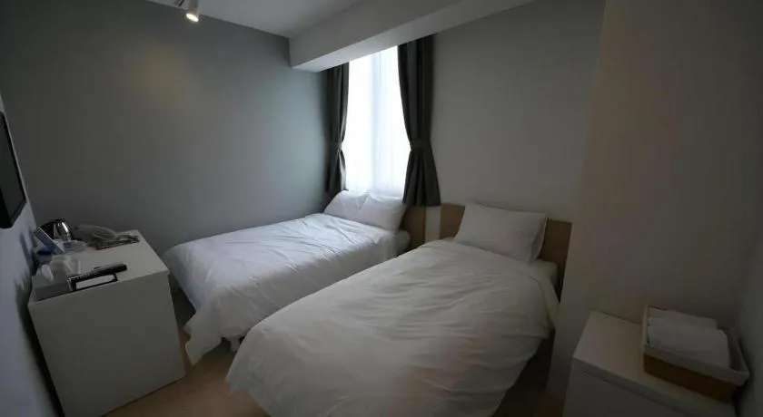 Bed in Wons Ville Myeongdong Hotel