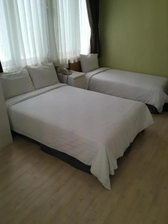 Bed in Wons Ville Myeongdong Hotel