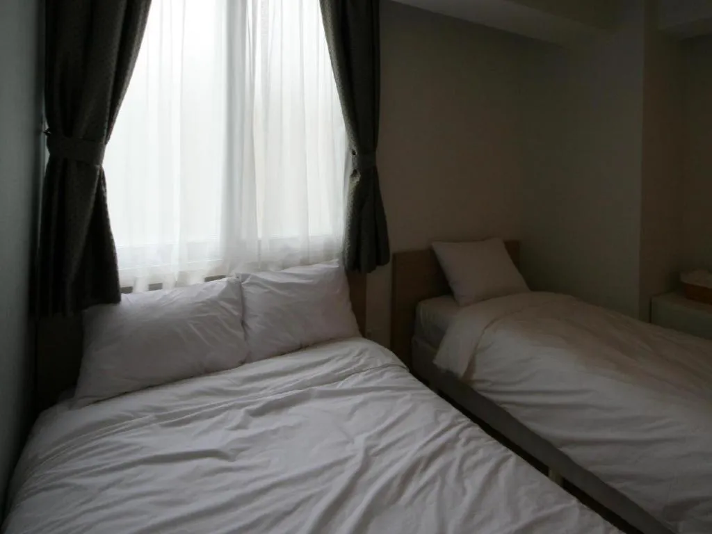 Bed in Wons Ville Myeongdong Hotel