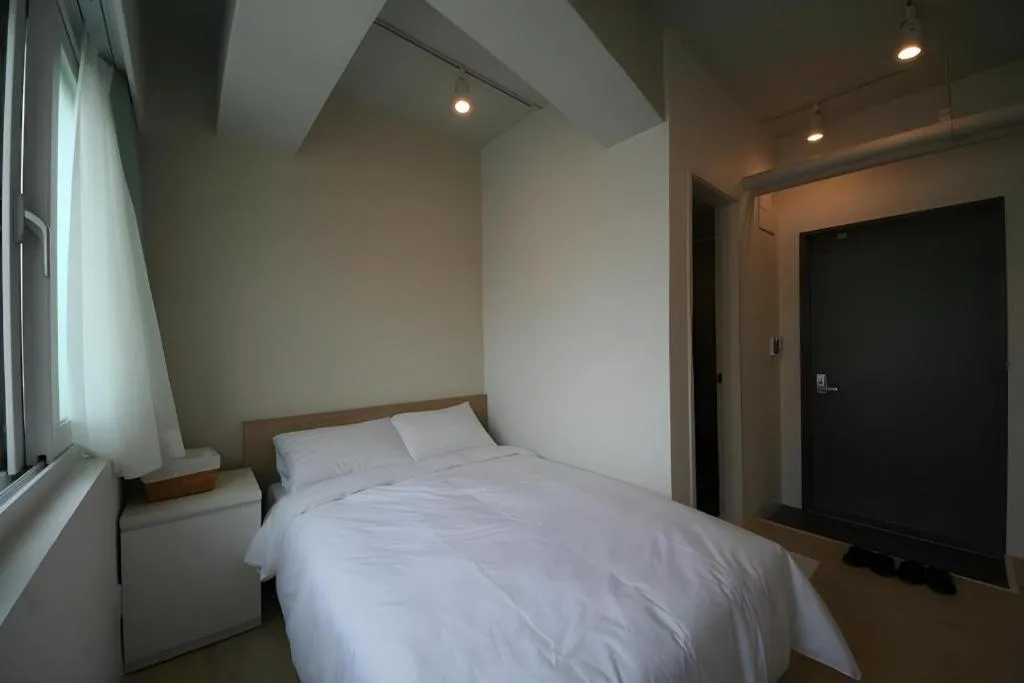 Bed in Wons Ville Myeongdong Hotel