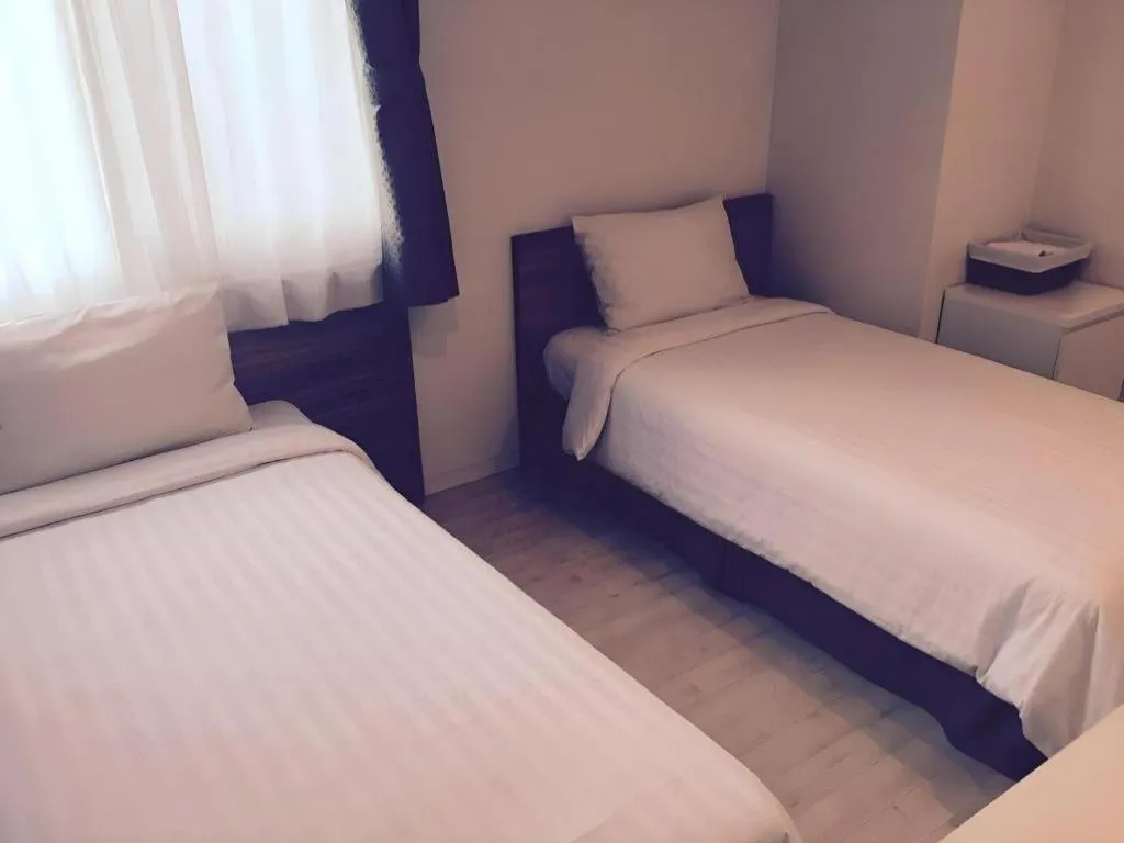 Bed in Wons Ville Myeongdong Hotel