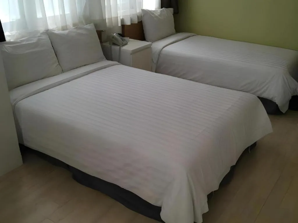 Bed in Wons Ville Myeongdong Hotel
