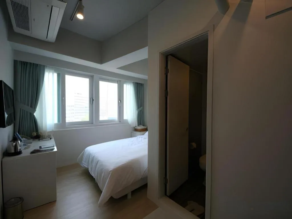 Bed in Wons Ville Myeongdong Hotel