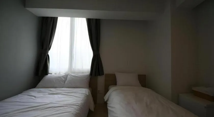 Bed in Wons Ville Myeongdong Hotel