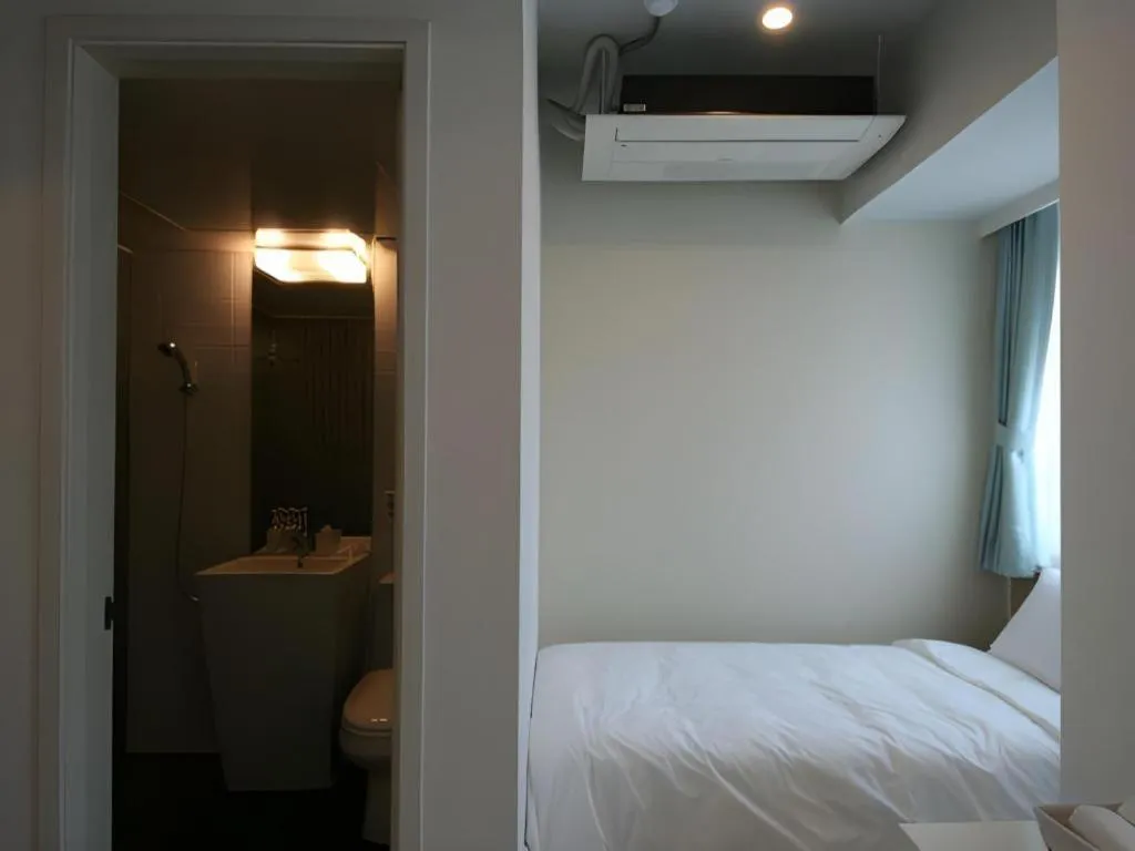 Bed in Wons Ville Myeongdong Hotel