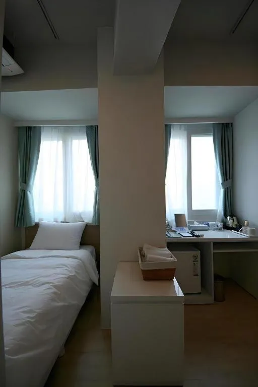 Bed in Wons Ville Myeongdong Hotel