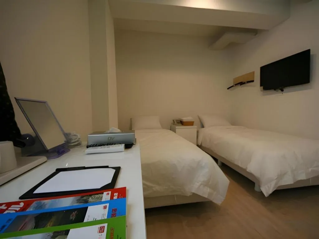 Bed in Wons Ville Myeongdong Hotel