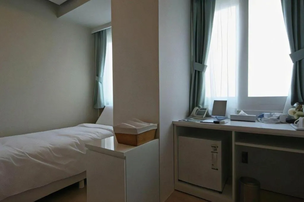 Bed in Wons Ville Myeongdong Hotel