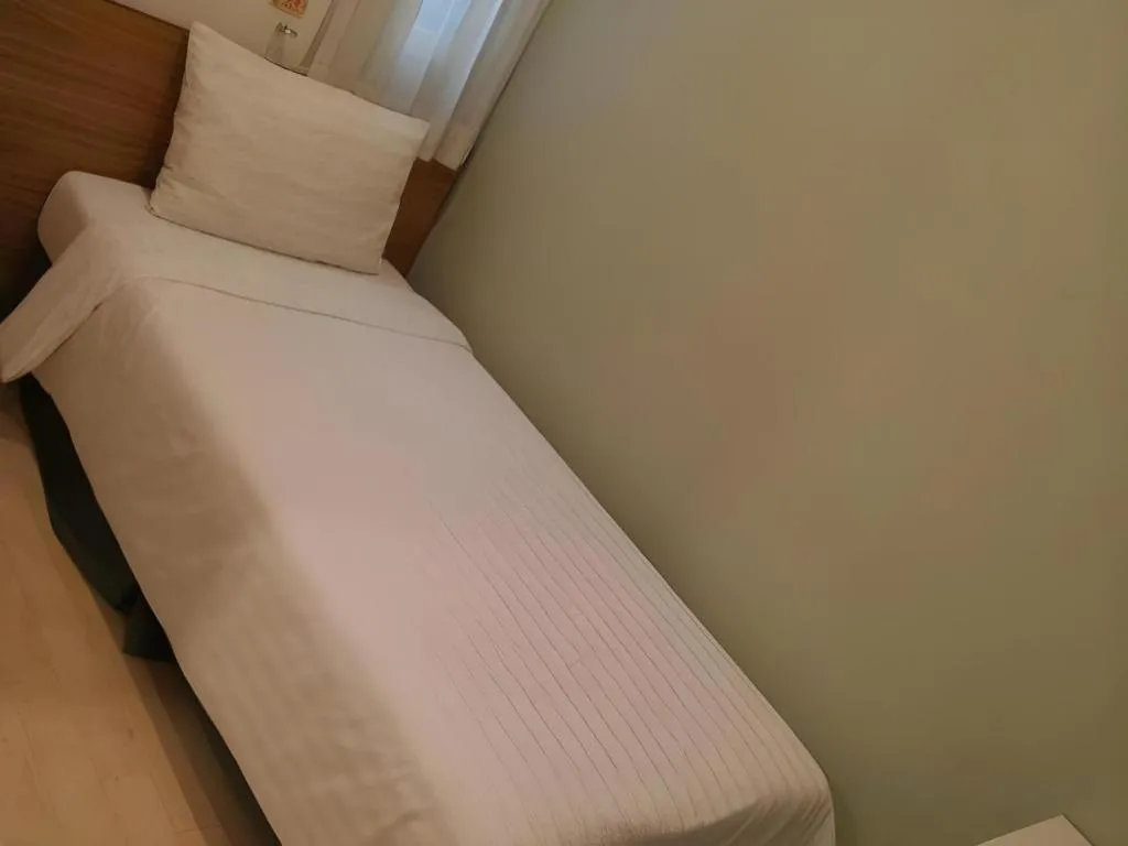 Bed in Wons Ville Myeongdong Hotel