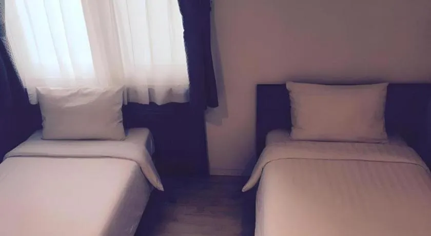 Bed in Wons Ville Myeongdong Hotel