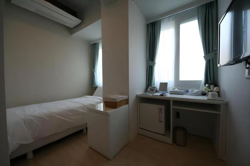 Bed in Wons Ville Myeongdong Hotel