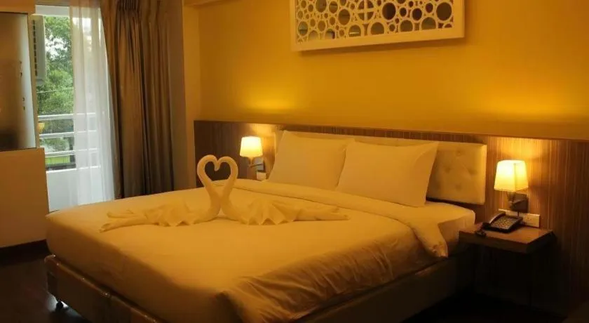 Bed in Chariot Pattaya Hotel