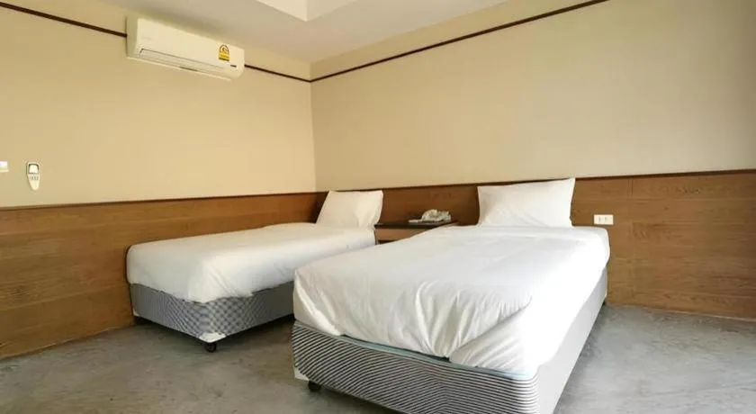 Bed in Nopparat Garden Hotel