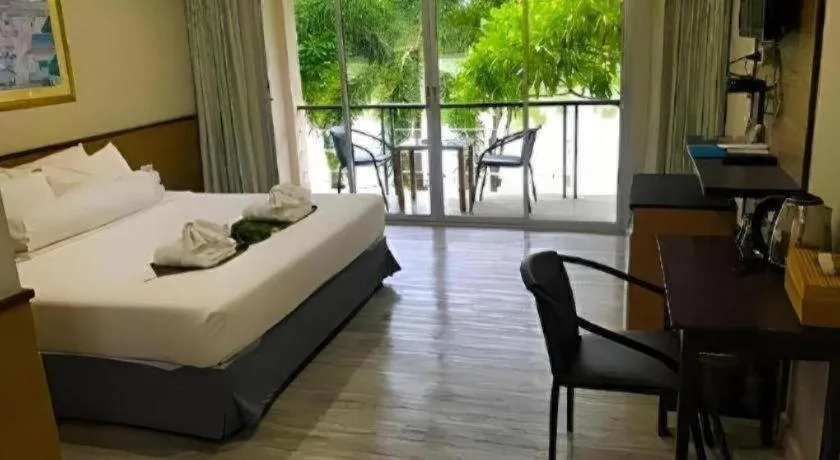 Bed in Nopparat Garden Hotel