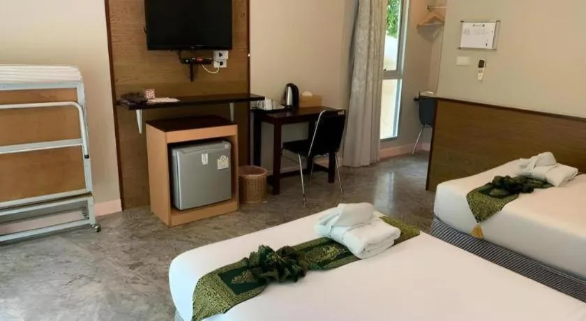 Bed in Nopparat Garden Hotel