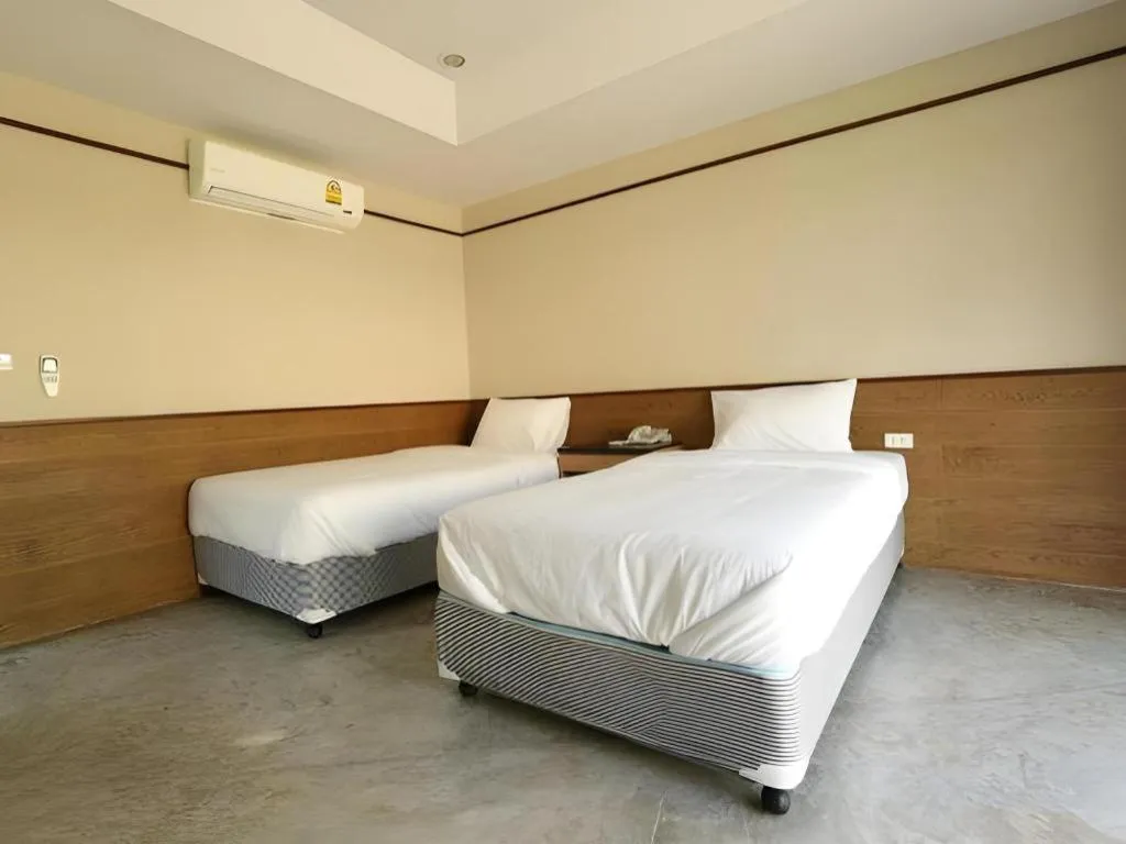 Bed in Nopparat Garden Hotel