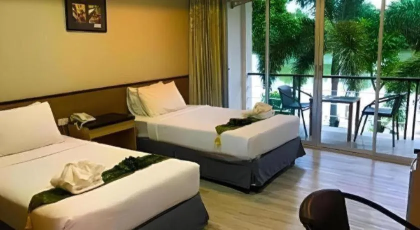 Bed in Nopparat Garden Hotel