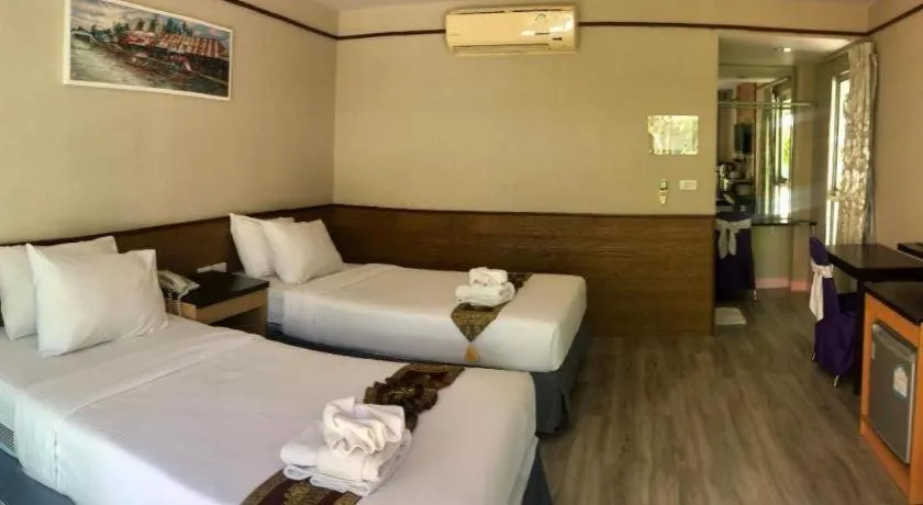 Bed in Nopparat Garden Hotel