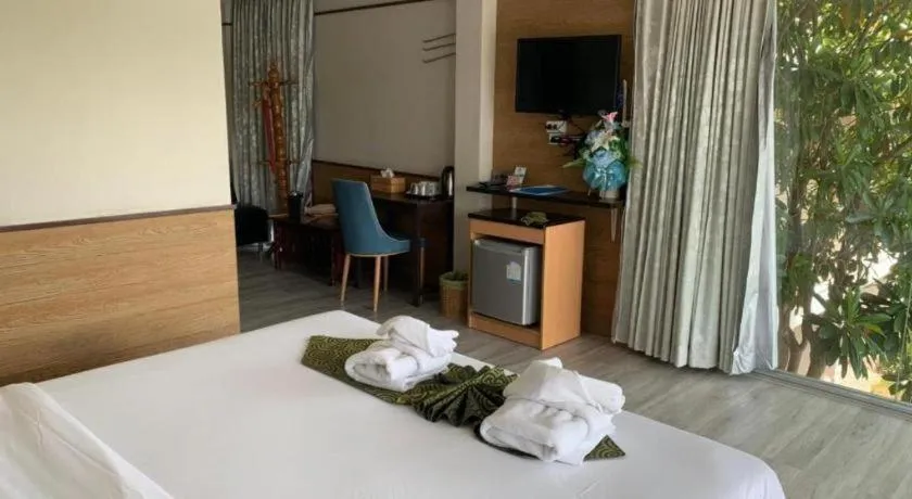 Bed in Nopparat Garden Hotel