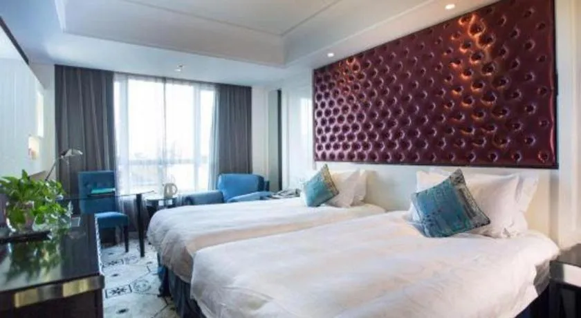 Bed in Wuyang Holiday Hotel Hangzhou