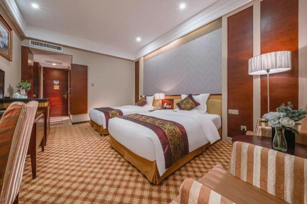 Bed in Nanning Yongjiang Hotel