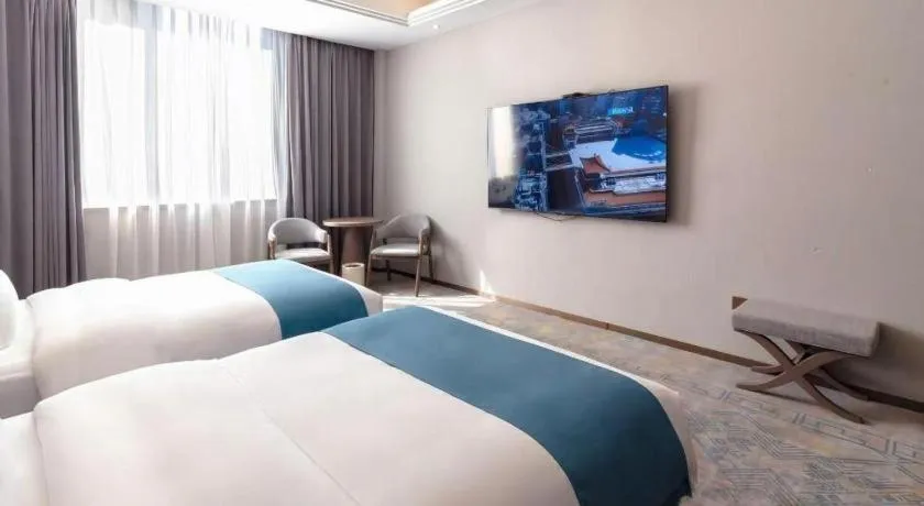 Bed in Nanning Yongjiang Hotel