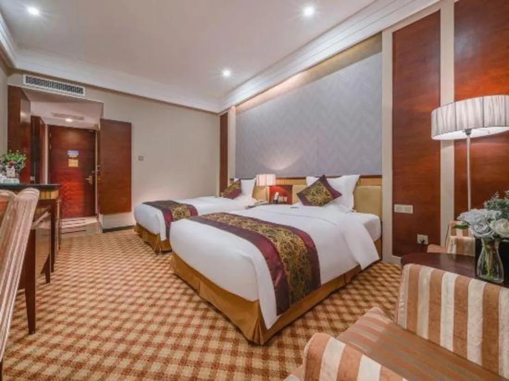 Bed in Nanning Yongjiang Hotel