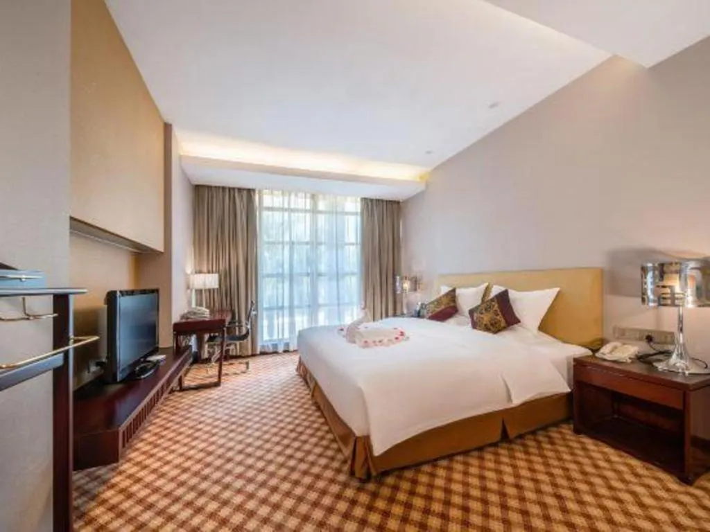 Bed in Nanning Yongjiang Hotel