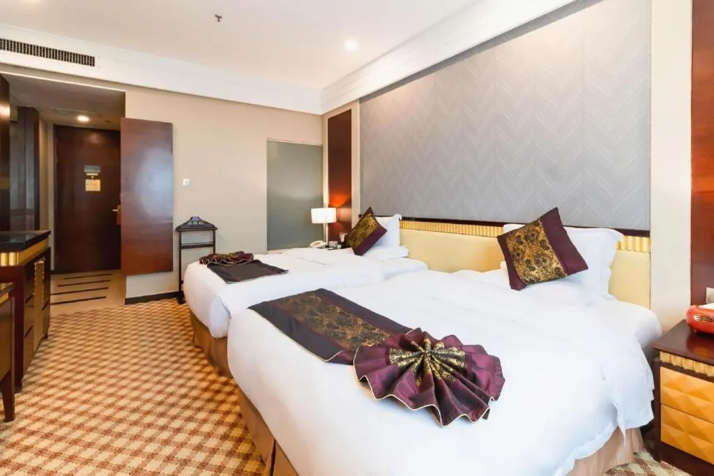 Bed in Nanning Yongjiang Hotel