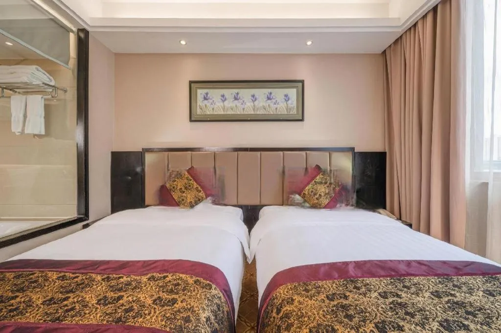 Bed in Nanning Yongjiang Hotel