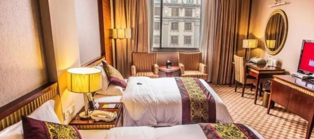 Bed in Nanning Yongjiang Hotel