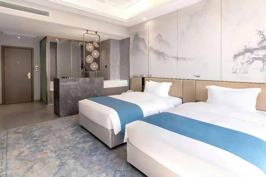 Bed in Nanning Yongjiang Hotel