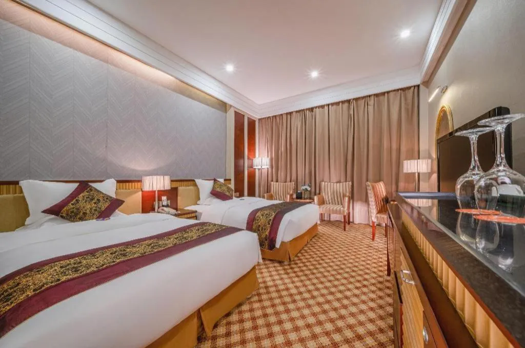 Bed in Nanning Yongjiang Hotel